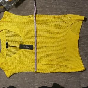 Sleeveless top uniq is the brand